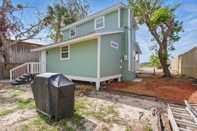 203 1st Ave SE, Steinhatchee, FL 32359 - back of house with fence