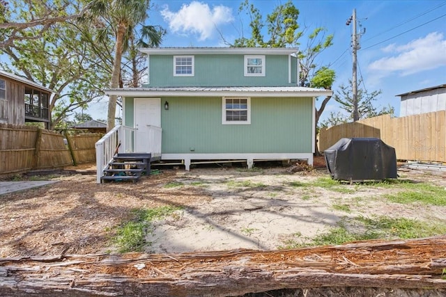 203 1st Ave SE, Steinhatchee, FL 32359 - back of house with fence