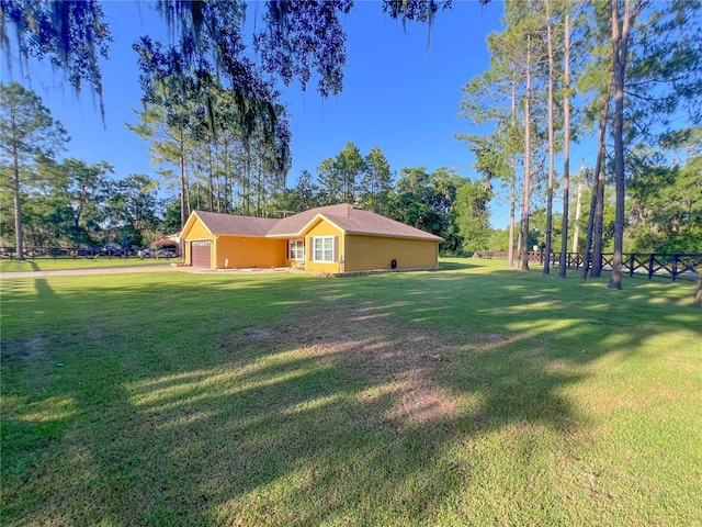 609 NE 2nd St, Williston, FL 32696 - view of side of property featuring an attached garage