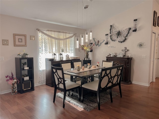 609 NE 2nd St, Williston, FL 32696 - dining room with wood finished floors, plenty of natural light, and baseboards