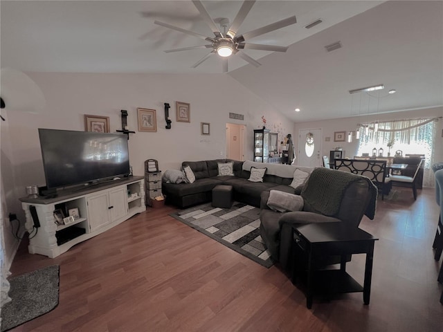 609 NE 2nd St, Williston, FL 32696 - living room with lofted ceiling, wood finished floors, and ceiling fan