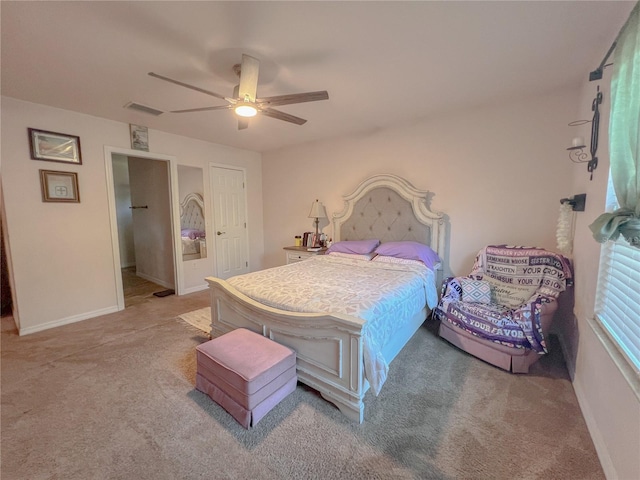 609 NE 2nd St, Williston, FL 32696 - carpeted bedroom featuring baseboards and a ceiling fan