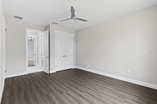 17781 SW 72nd Street Rd, Dunnellon, FL 34432 - unfurnished bedroom featuring wood finished floors, a closet, and ceiling fan
