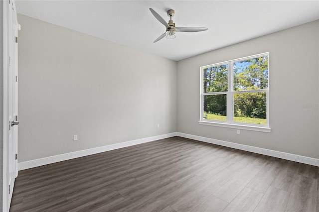 17781 SW 72nd Street Rd, Dunnellon, FL 34432 - empty room with dark wood finished floors and ceiling fan