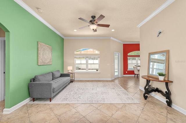 19152 NW 228th Way, High Springs, FL 32643 - living area with a ceiling fan, ornamental molding, baseboards, arched walkways, and recessed lighting