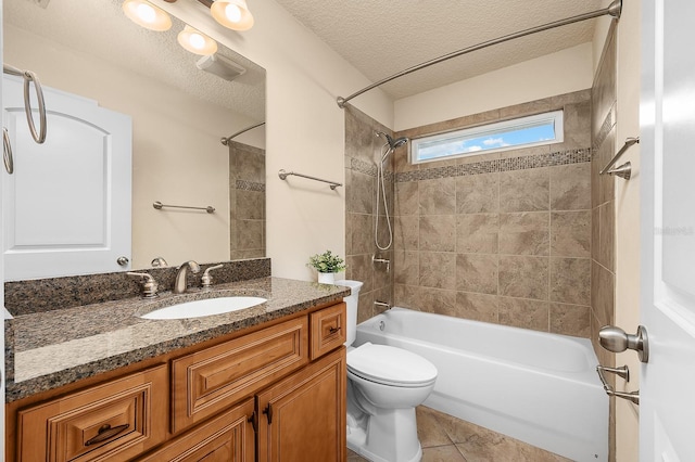 19152 NW 228th Way, High Springs, FL 32643 - bathroom with a textured ceiling, tub / shower combination, vanity, toilet, and tile patterned floors