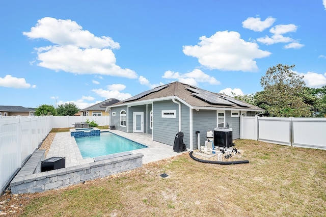 19152 NW 228th Way, High Springs, FL 32643 - view of swimming pool featuring a patio, a pool with connected hot tub, and central AC unit