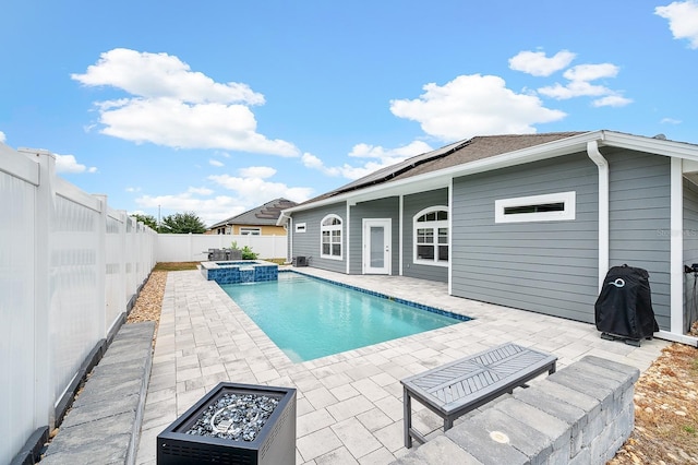 19152 NW 228th Way, High Springs, FL 32643 - view of pool featuring a fenced backyard, a patio area, and a pool with connected hot tub