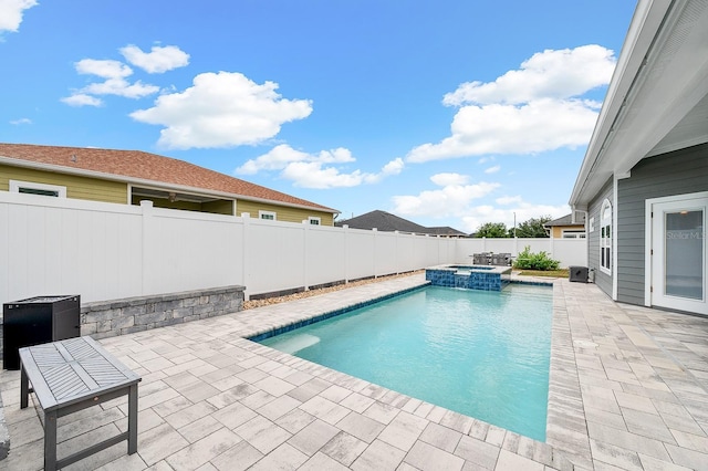 19152 NW 228th Way, High Springs, FL 32643 - view of pool with a patio area, a fenced backyard, and a pool with connected hot tub