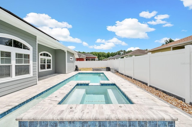 19152 NW 228th Way, High Springs, FL 32643 - view of pool with a fenced backyard, a patio area, and a pool with connected hot tub