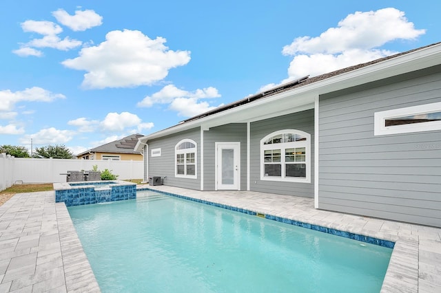 19152 NW 228th Way, High Springs, FL 32643 - view of pool with a fenced backyard, a patio, and a pool with connected hot tub