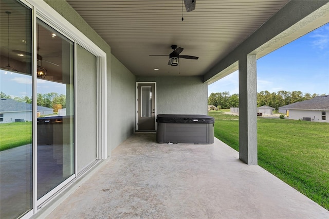 17887 SW 72nd Street Rd, Dunnellon, FL 34432 - view of patio with ceiling fan and a hot tub