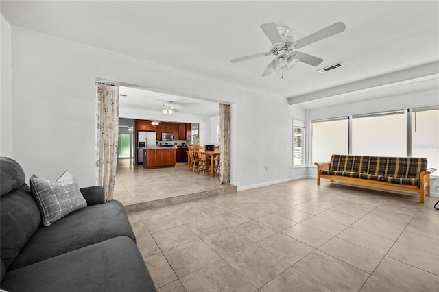 4023 SW 19th St, Gainesville, FL 32608 - living area with light tile patterned floors, ceiling fan, ornamental molding, and baseboards