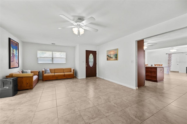 4023 SW 19th St, Gainesville, FL 32608 - entryway featuring ceiling fan, light tile patterned flooring, and baseboards