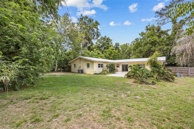 4023 SW 19th St, Gainesville, FL 32608 - back of property featuring a patio area and cooling unit