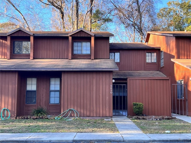 5830 SW 9th Pl, Gainesville, FL 32607 - view of front facade featuring a gate