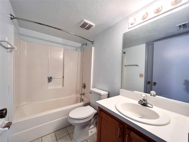 5830 SW 9th Pl, Gainesville, FL 32607 - bathroom with tile patterned floors, shower / bathtub combination, vanity, a textured ceiling, and toilet