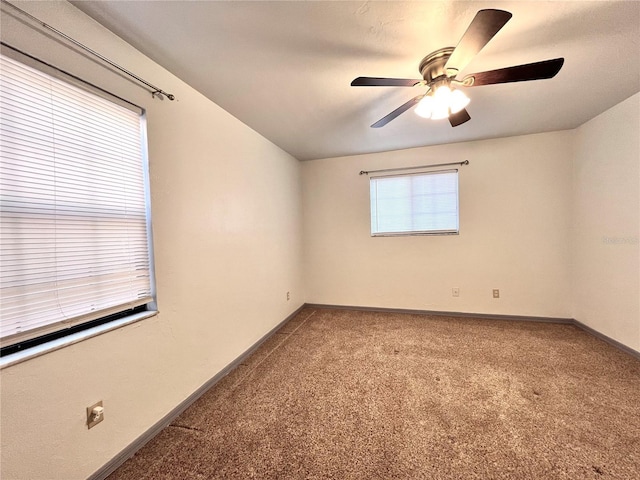 5830 SW 9th Pl, Gainesville, FL 32607 - carpeted empty room featuring a ceiling fan and baseboards
