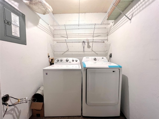 5830 SW 9th Pl, Gainesville, FL 32607 - washroom featuring washer and dryer and electric panel