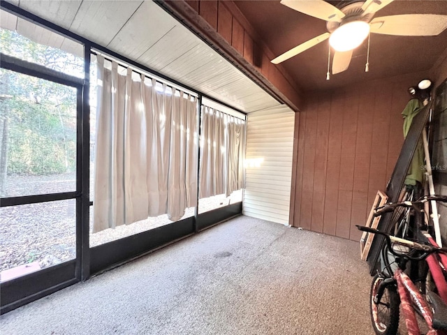 5830 SW 9th Pl, Gainesville, FL 32607 - unfurnished sunroom featuring ceiling fan