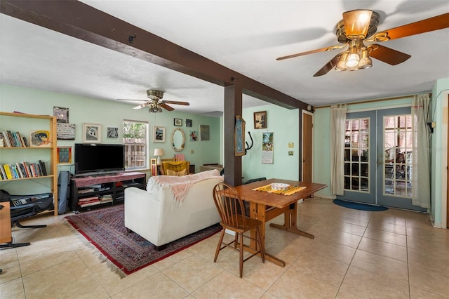 535 NE 9th Ave, Gainesville, FL 32601 - living room featuring ceiling fan, french doors, healthy amount of natural light, and tile patterned floors