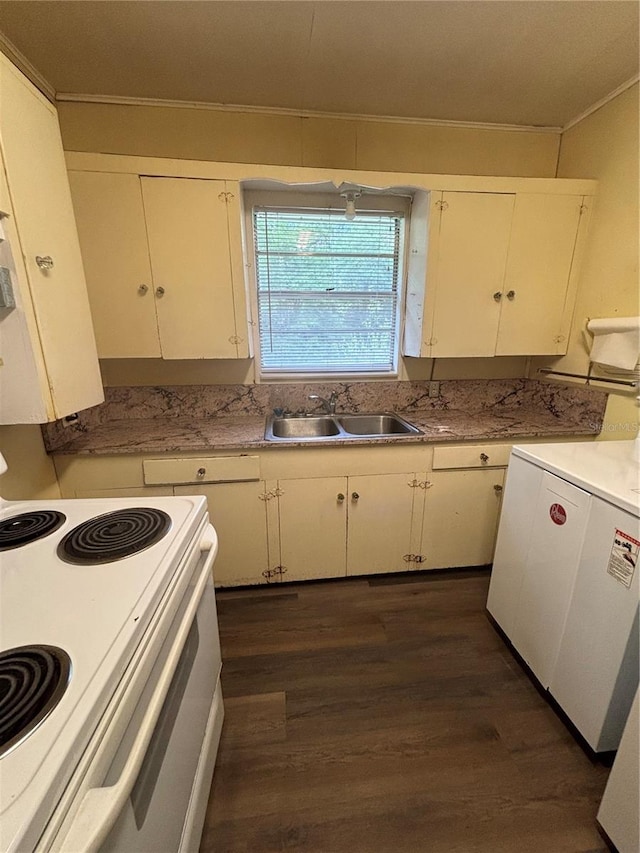 kitchen featuring white electric range, a sink, crown molding, dark wood-type flooring, and white cabinets