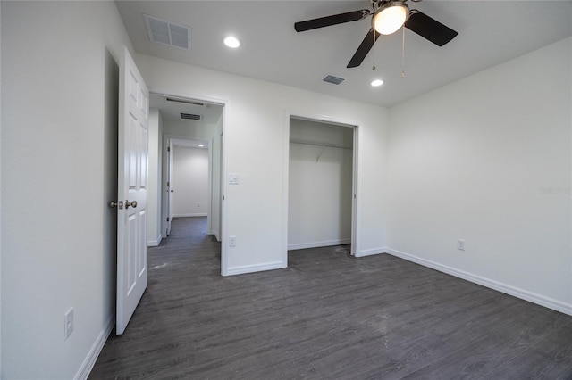unfurnished bedroom featuring baseboards, dark wood-style flooring, recessed lighting, a closet, and ceiling fan