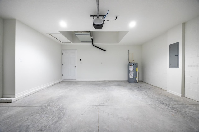 garage featuring water heater, electric panel, and a garage door opener