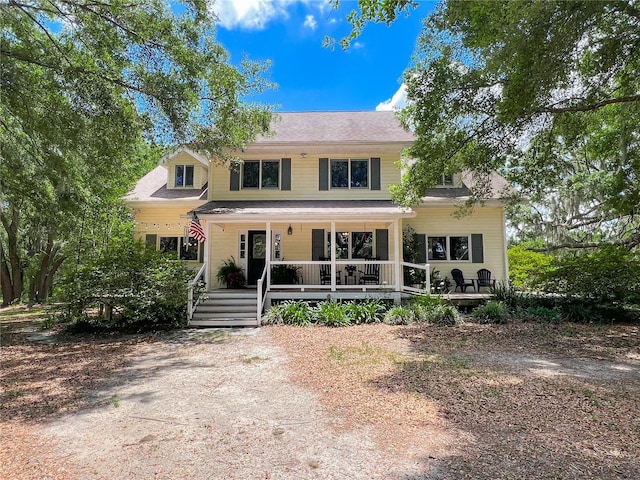 view of front of property featuring covered porch