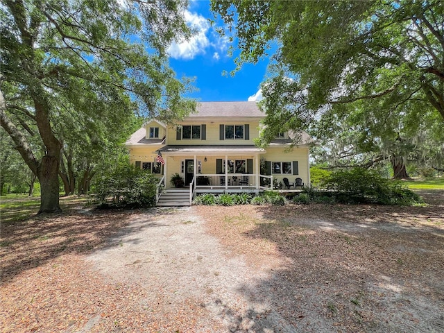 traditional-style house with a porch