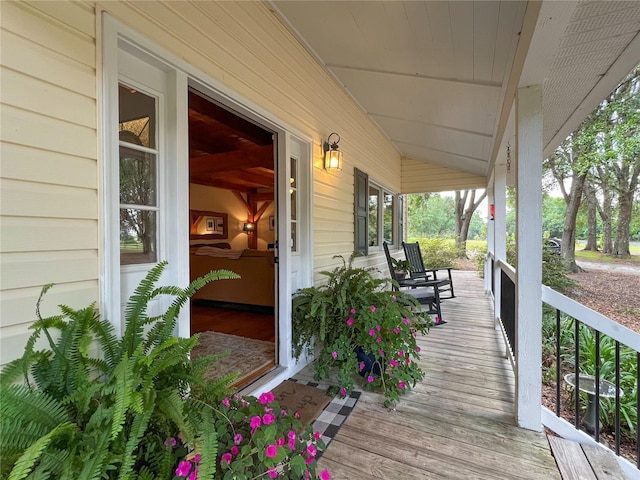 deck featuring covered porch
