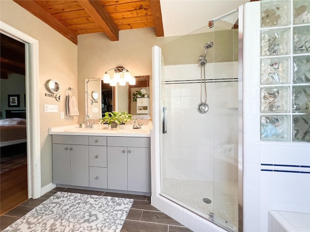 bathroom featuring wood ceiling, beamed ceiling, a stall shower, double vanity, and ensuite bath