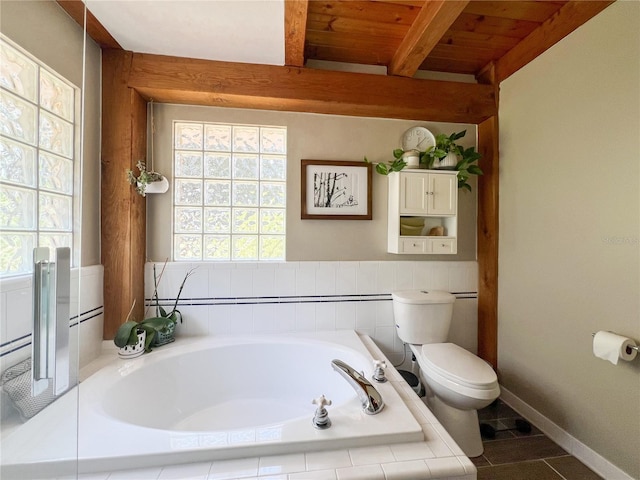 bathroom featuring beam ceiling, toilet, a bath, tile patterned flooring, and wooden ceiling