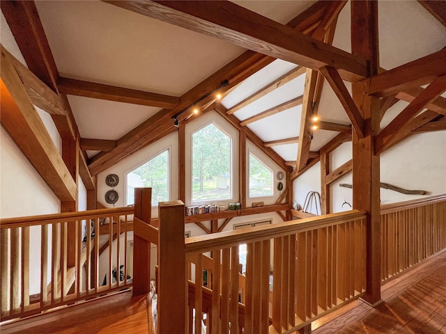 additional living space featuring wood finished floors