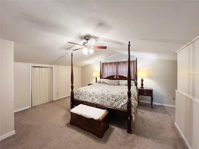 bedroom featuring lofted ceiling, carpet floors, baseboards, and a ceiling fan