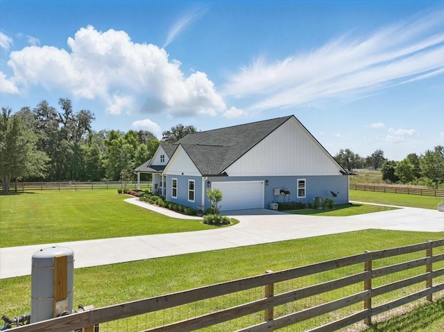view of home's exterior featuring concrete driveway, a garage, board and batten siding, and a shingled roof