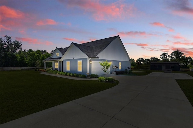 view of front of home featuring driveway and board and batten siding