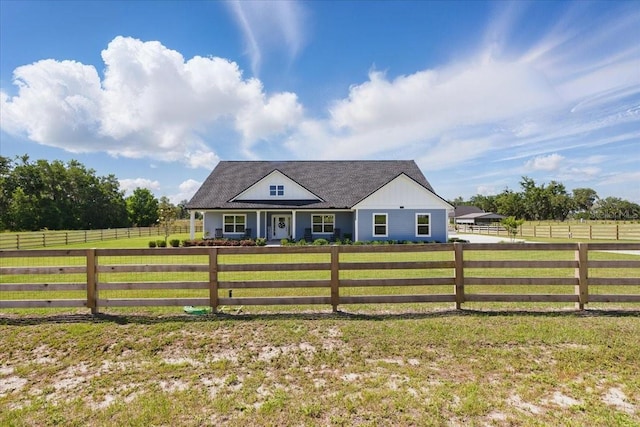 view of front facade with a view of countryside and board and batten siding