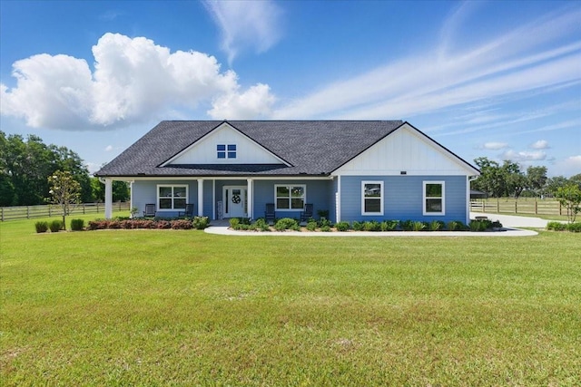 modern inspired farmhouse featuring a shingled roof