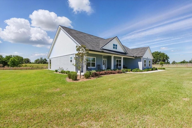 modern farmhouse style home featuring roof with shingles