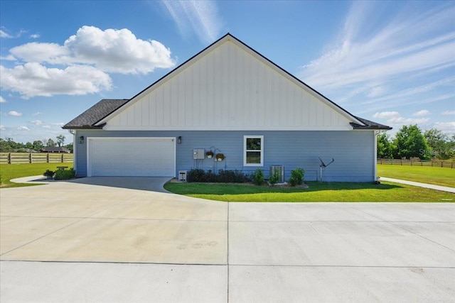 view of property exterior with concrete driveway, a garage, board and batten siding, and cooling unit