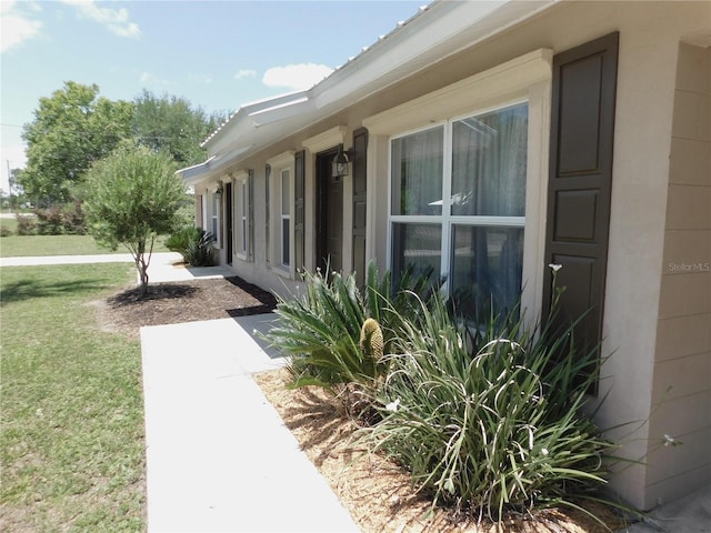 721 Town Ct Unit A & B, Bronson, FL 32621 - view of side of property with a yard