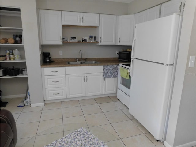 721 Town Ct Unit A & B, Bronson, FL 32621 - kitchen featuring white appliances, a sink, open shelves, white cabinets, and light tile patterned floors