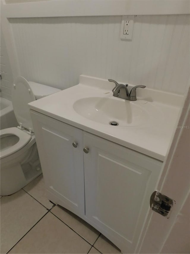721 Town Ct Unit A & B, Bronson, FL 32621 - bathroom featuring vanity, tile patterned flooring, toilet, and a bath