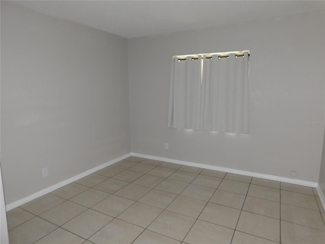 721 Town Ct Unit A & B, Bronson, FL 32621 - spare room with light tile patterned flooring and baseboards