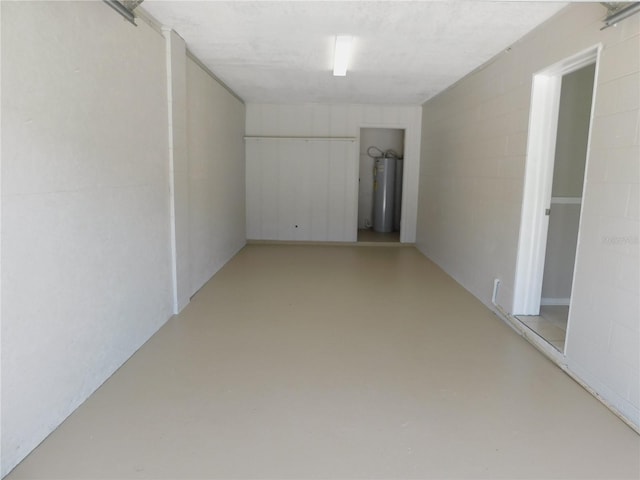 721 Town Ct Unit A & B, Bronson, FL 32621 - unfurnished room with concrete flooring and water heater