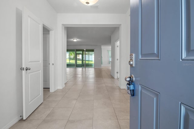 4261 SW 62nd Loop, Ocala, FL 34474 - entryway with light tile patterned flooring and baseboards