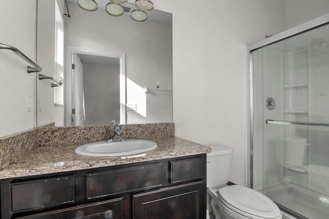 4261 SW 62nd Loop, Ocala, FL 34474 - bathroom with toilet, a shower stall, and vanity