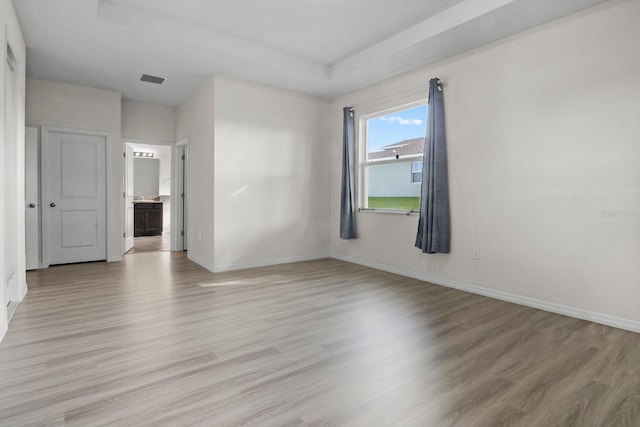 4261 SW 62nd Loop, Ocala, FL 34474 - unfurnished room with light wood finished floors and baseboards