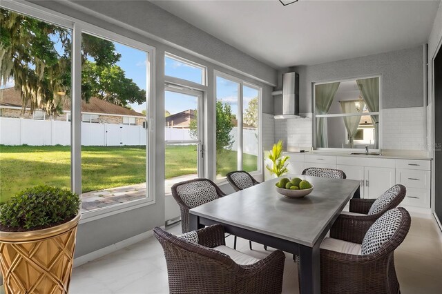 4261 SW 62nd Loop, Ocala, FL 34474 - sunroom featuring a sink and outdoor dining area